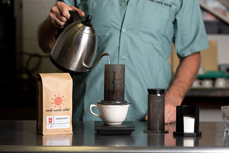 Pour 1-2 oz of water into aeropress while stirring.